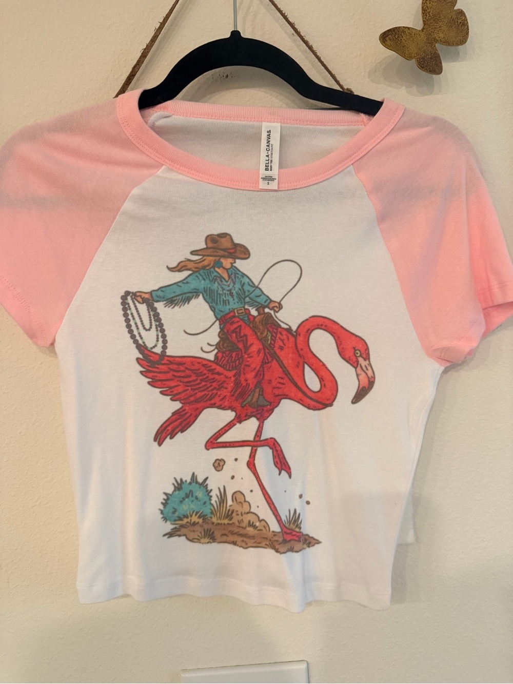 Bella Canvas White Crop Top with Pink Raglan Sleeves and Flamingo Rider Graphic